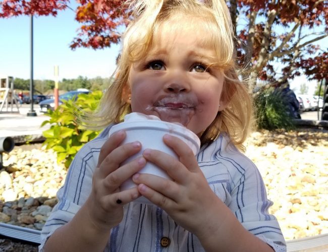 a kid enjoying ice cream