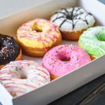 A box of colorful donuts